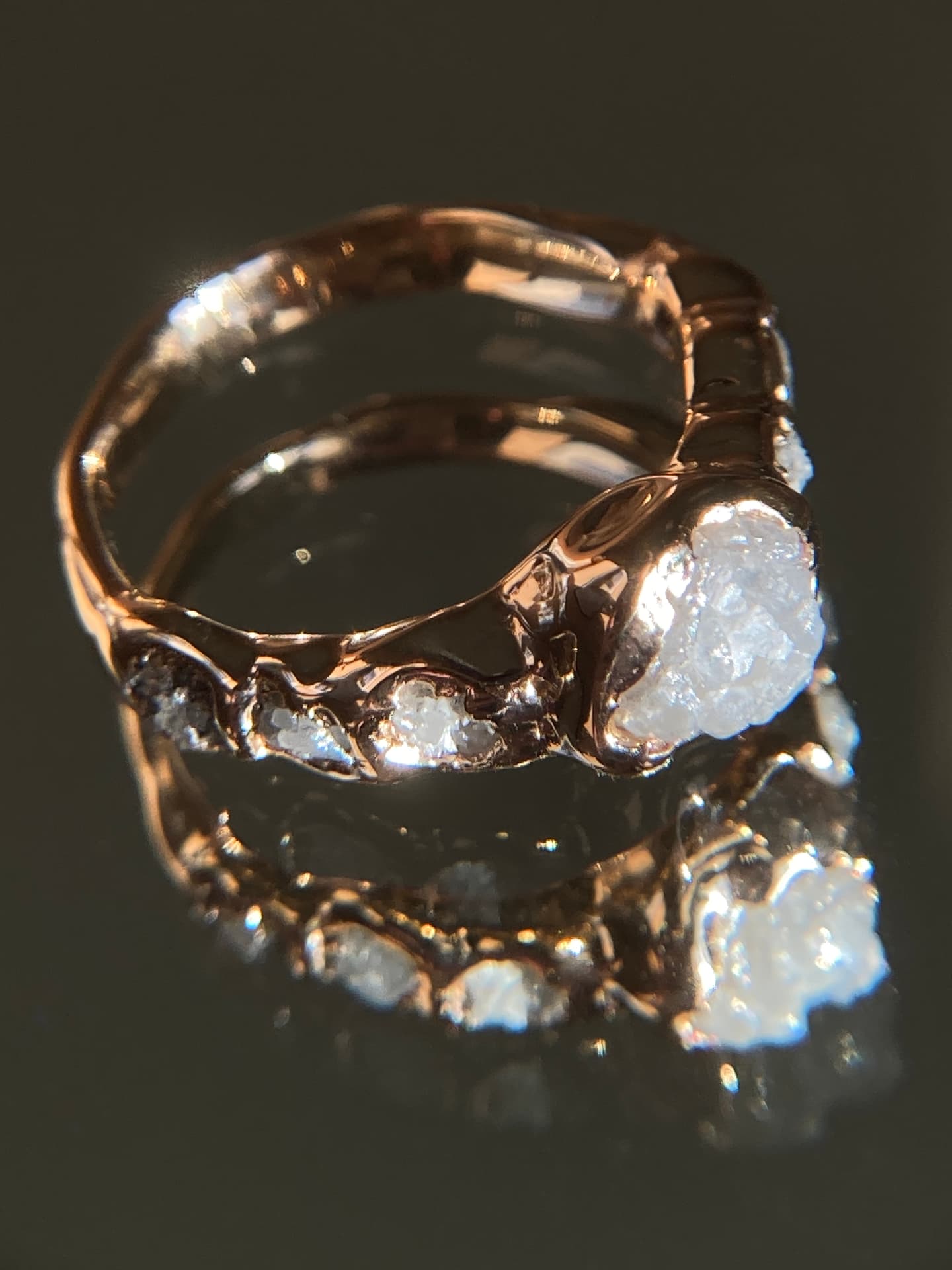 Bespoke gold ring set with raw diamonds