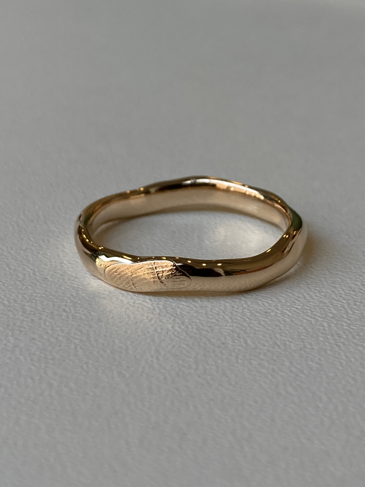 Bespoke sculptural gold band